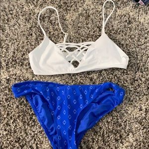 white top and blue bottoms with white accents
